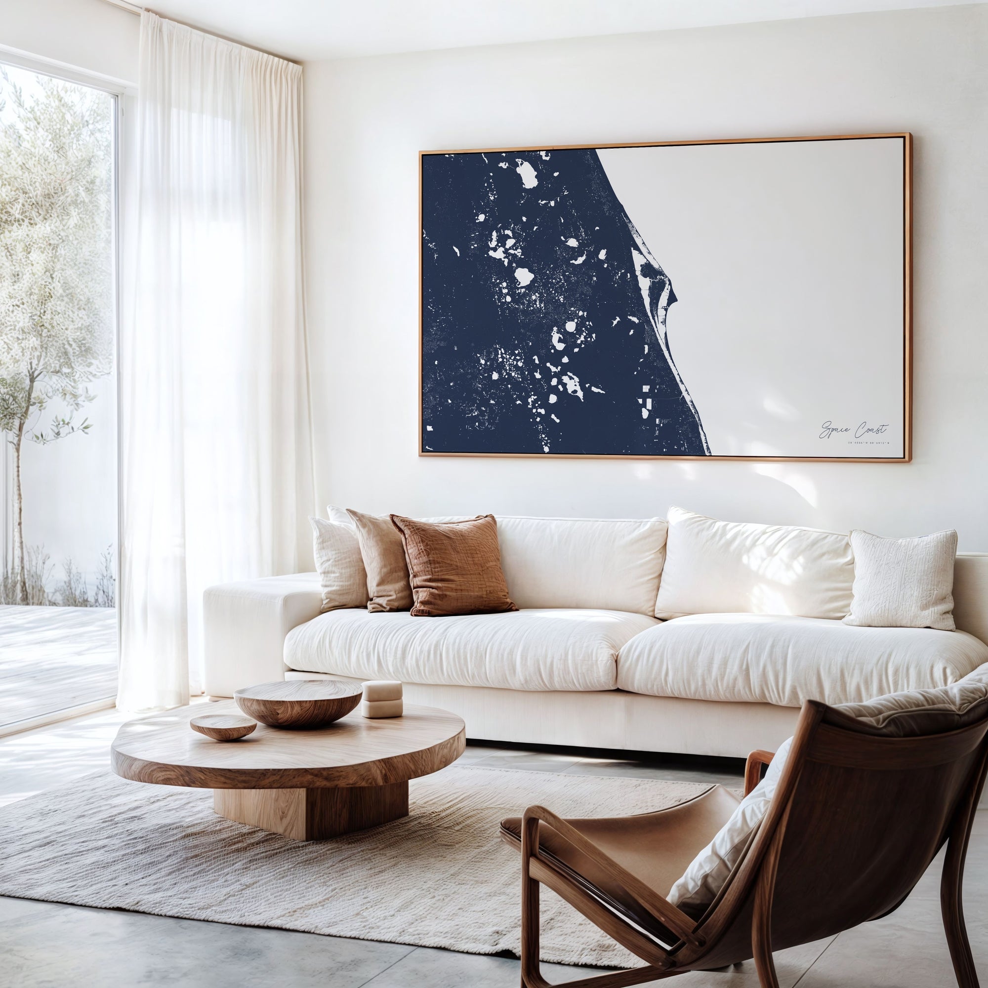Space Coast navy horizontal canvas map in an oak framed room scene