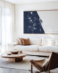 Space Coast navy horizontal canvas map in an oak framed room scene