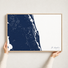 St. Augustine canvas map — hands holding the canvas in an oak frame