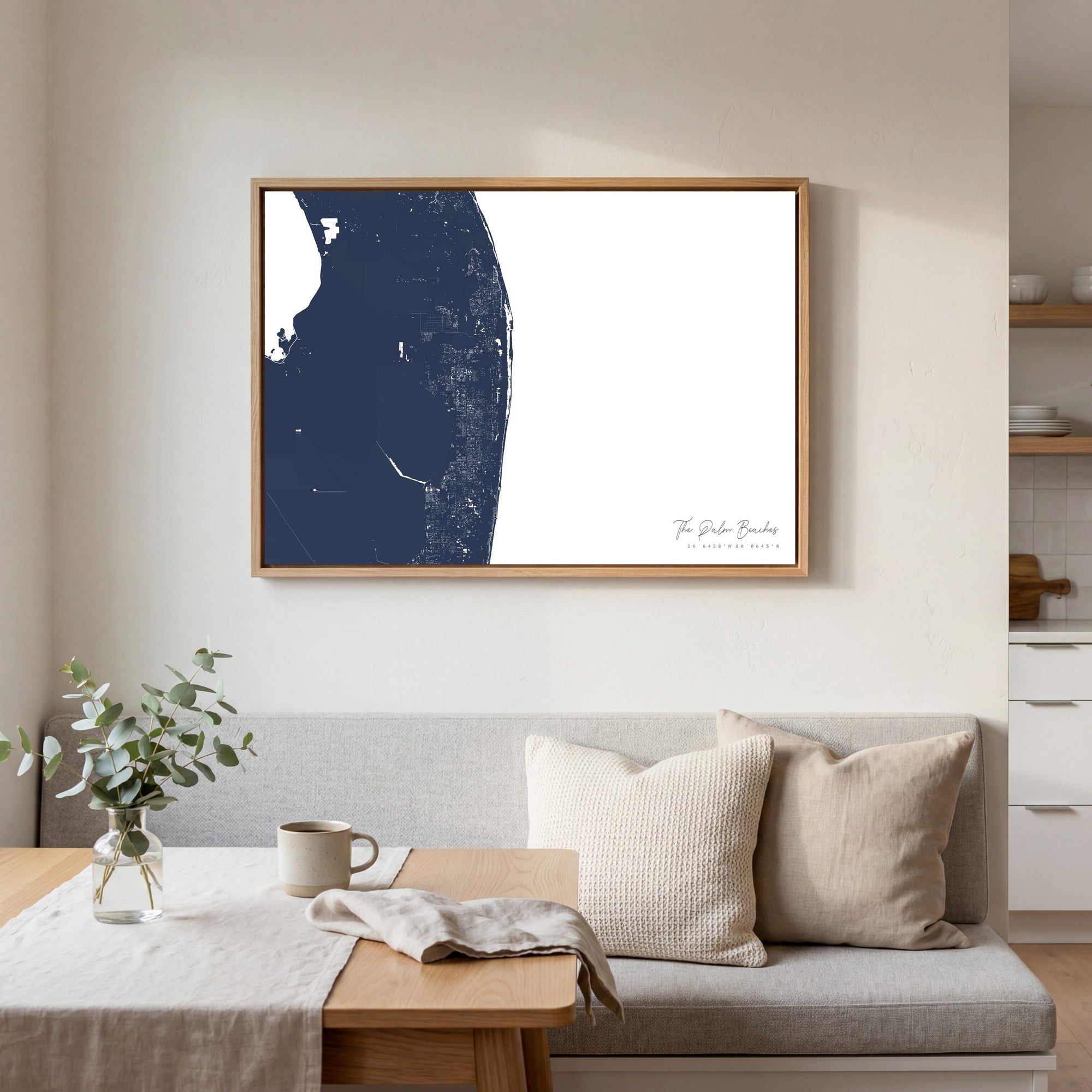 The Palm Beaches navy horizontal canvas map in an oak framed room scene