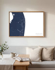 The Palm Beaches navy horizontal canvas map in an oak framed room scene