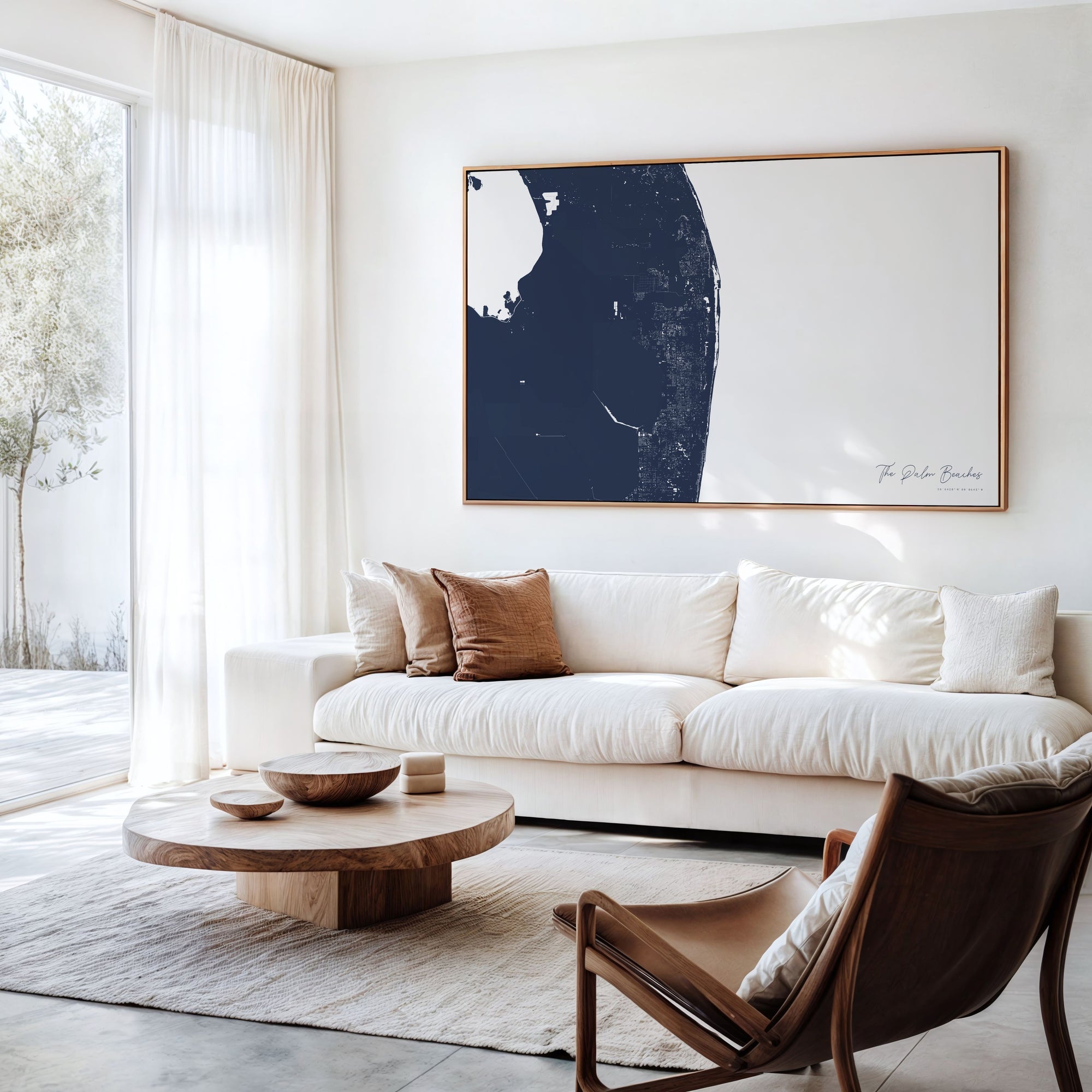 The Palm Beaches navy horizontal canvas map in an oak framed room scene
