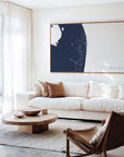 The Palm Beaches navy horizontal canvas map in an oak framed room scene