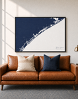 Topsail Island canvas map — two-pillow black-frame sofa interior