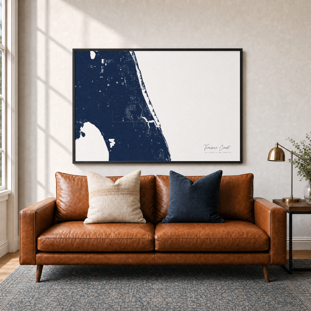 Treasure Coast canvas map — two-pillow black-frame sofa interior