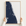 Treasure Coast canvas map — hands holding the canvas in an oak frame