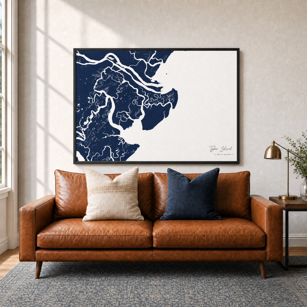 Tybee Island canvas map — two-pillow black-frame sofa interior