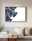 Tybee Island navy horizontal canvas map in an oak framed room scene