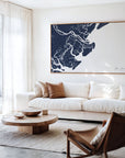 Tybee Island navy horizontal canvas map in an oak framed room scene