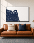 Virginia Beach canvas map — two-pillow black-frame sofa interior
