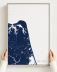 Virginia Beach canvas map — hands holding the canvas in an oak frame